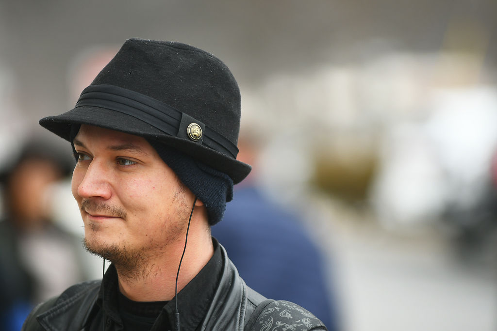 Christopher Coldwell socializes outside during the Project Homeless Connect winter 2020